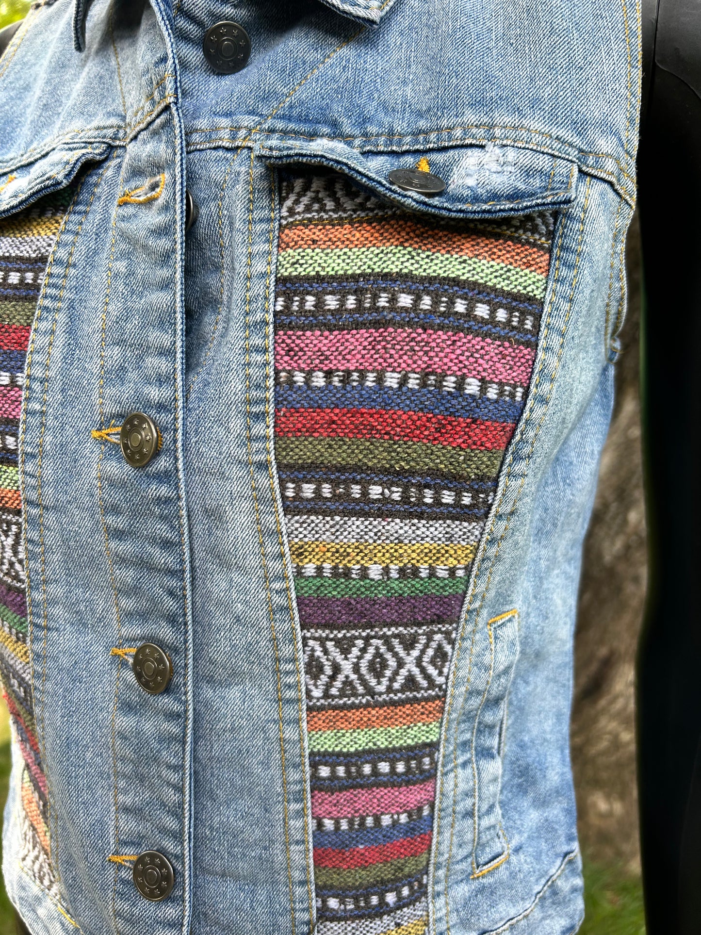 Upcycled Jean vest with leather back patch